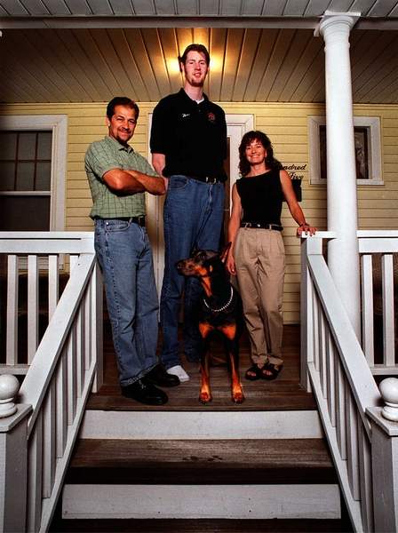 Neil Fingleton in 2000 with the couple who hosted him during his stay in Worcester